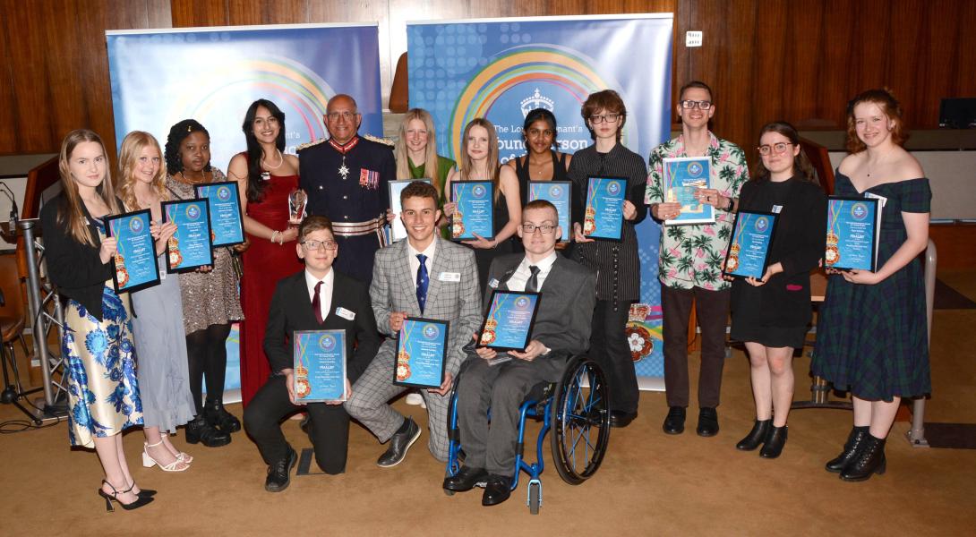 The finalists of the Lord-Lieutenant's Awards holding their certificates, standing with the Lord-Lieutenant