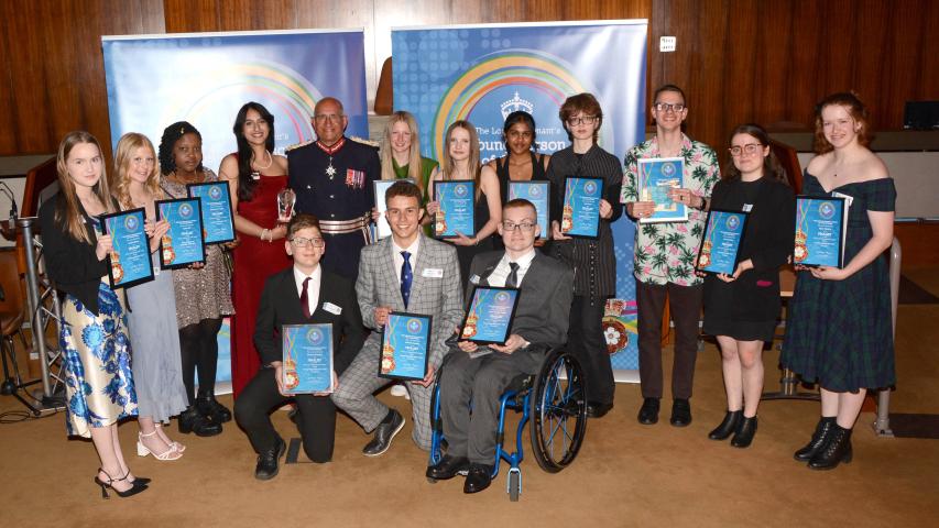 The finalists of the Lord-Lieutenant's Awards holding their certificates, standing with the Lord-Lieutenant